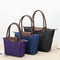 Women’s Handbag with Zipper Closure and Top Handles